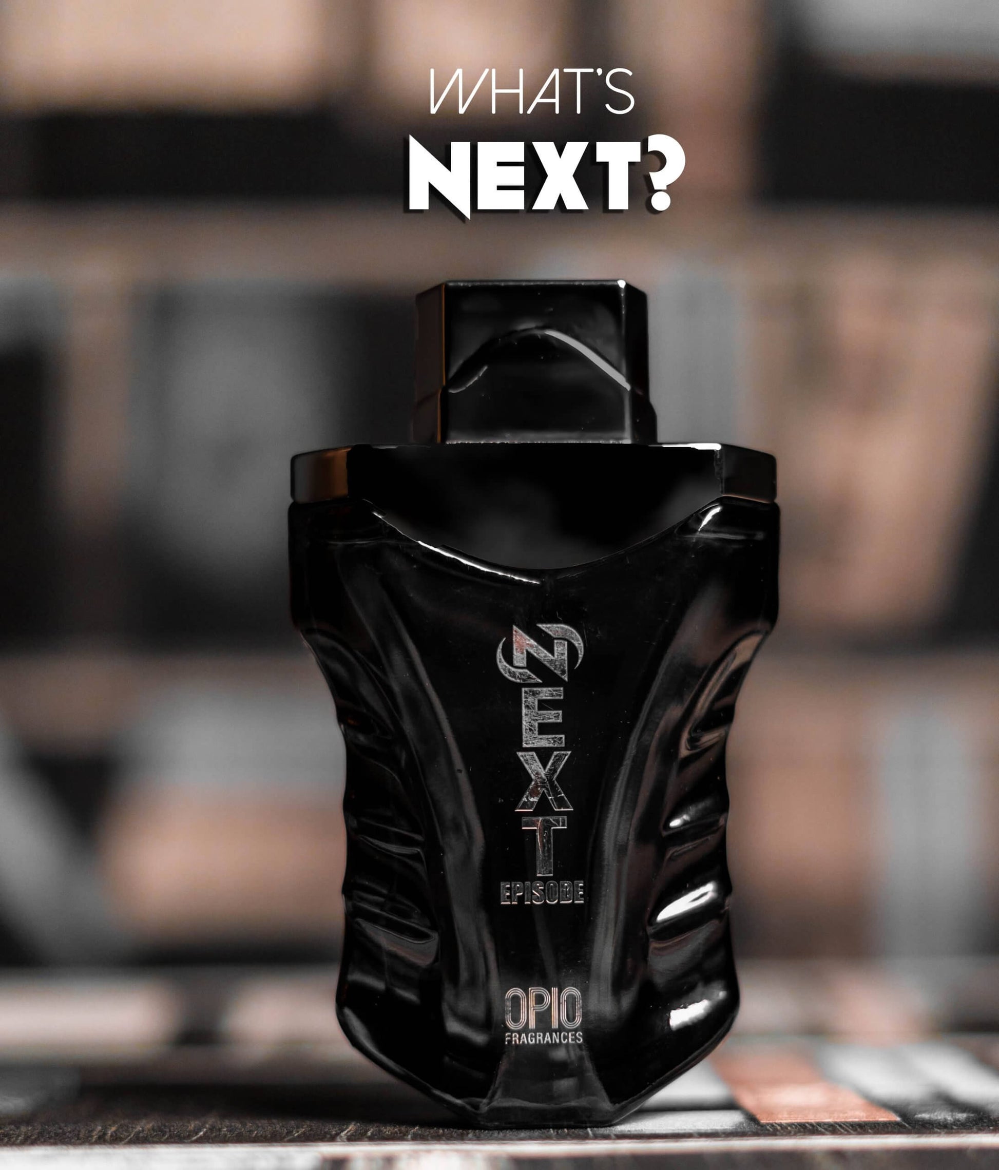 A bottle of 'NEXT EPISODE EDP' by OPIO, with a sleek black design.