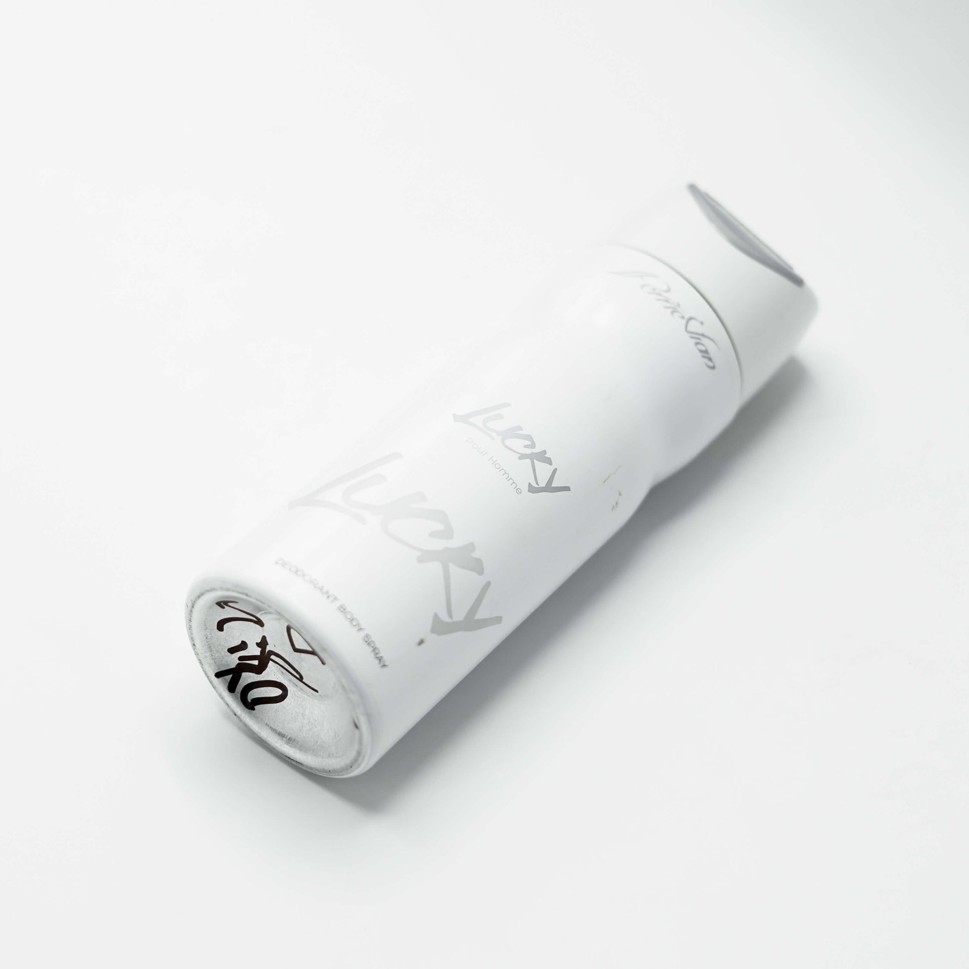 A LUCKY body spray for men deodorant on a white background