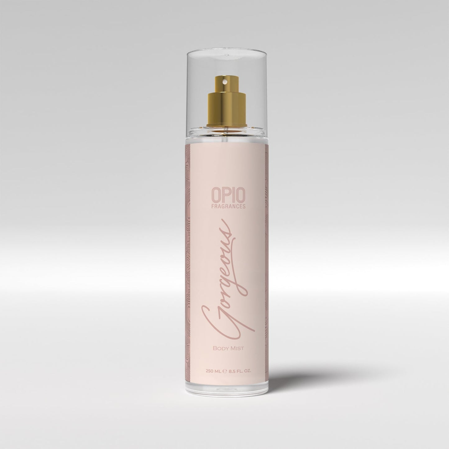 A bottle of body mist with a floral design.