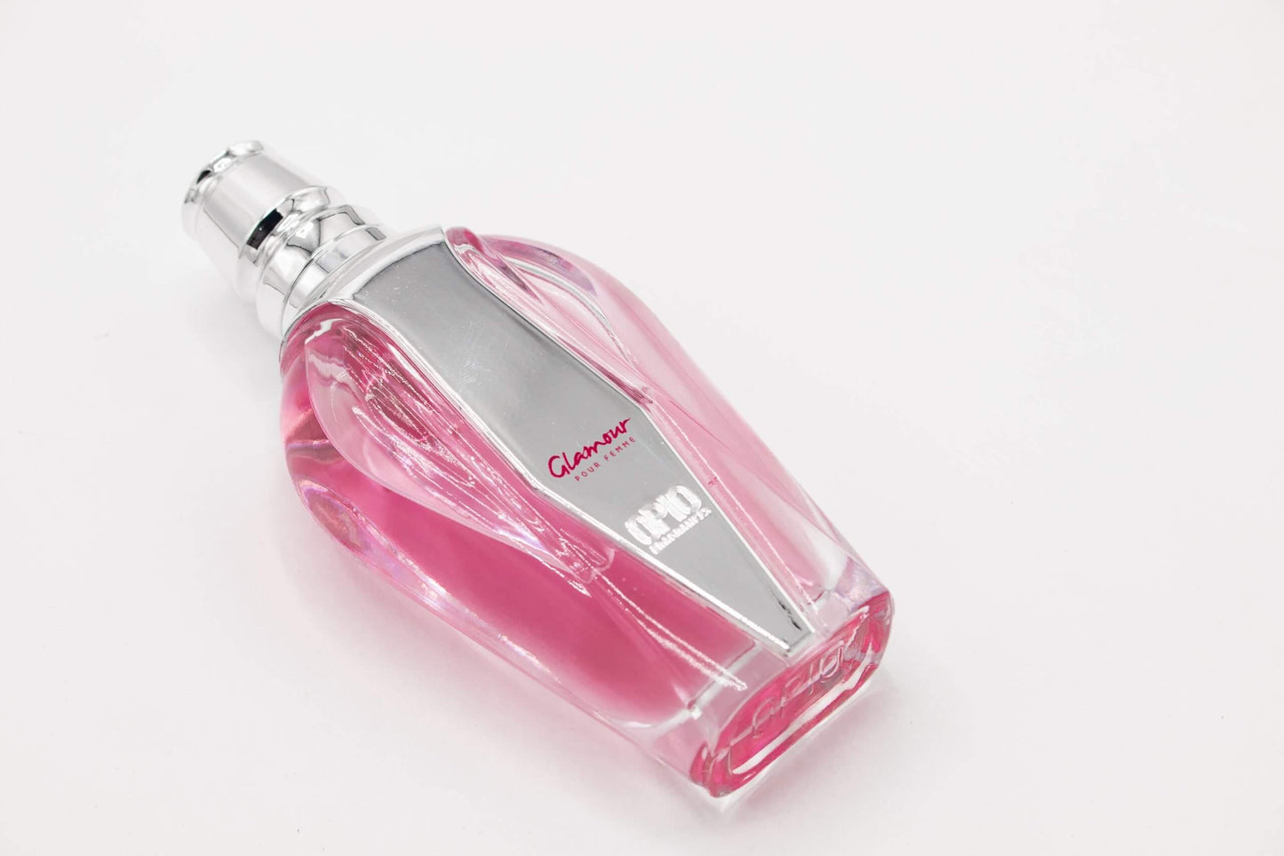 A bottle of 'Glamour' EDP by OPIO with a pink and white floral design.