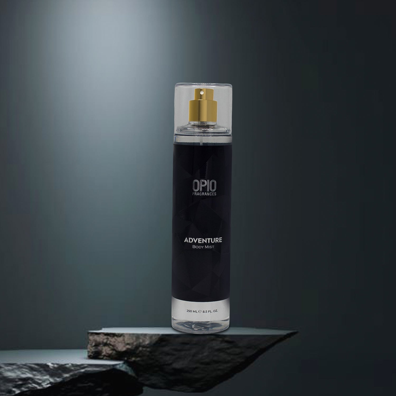 Black body mist bottle with gold cap on a dark gray background
