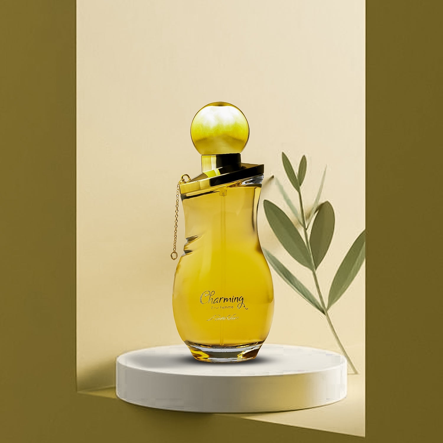 A 100ml bottle of 'CHARMING EDP' for women displayed on a white pedestal with a yellow liquid inside. The bottle has a golden cap and there is a green leaf to the top right of the image.
