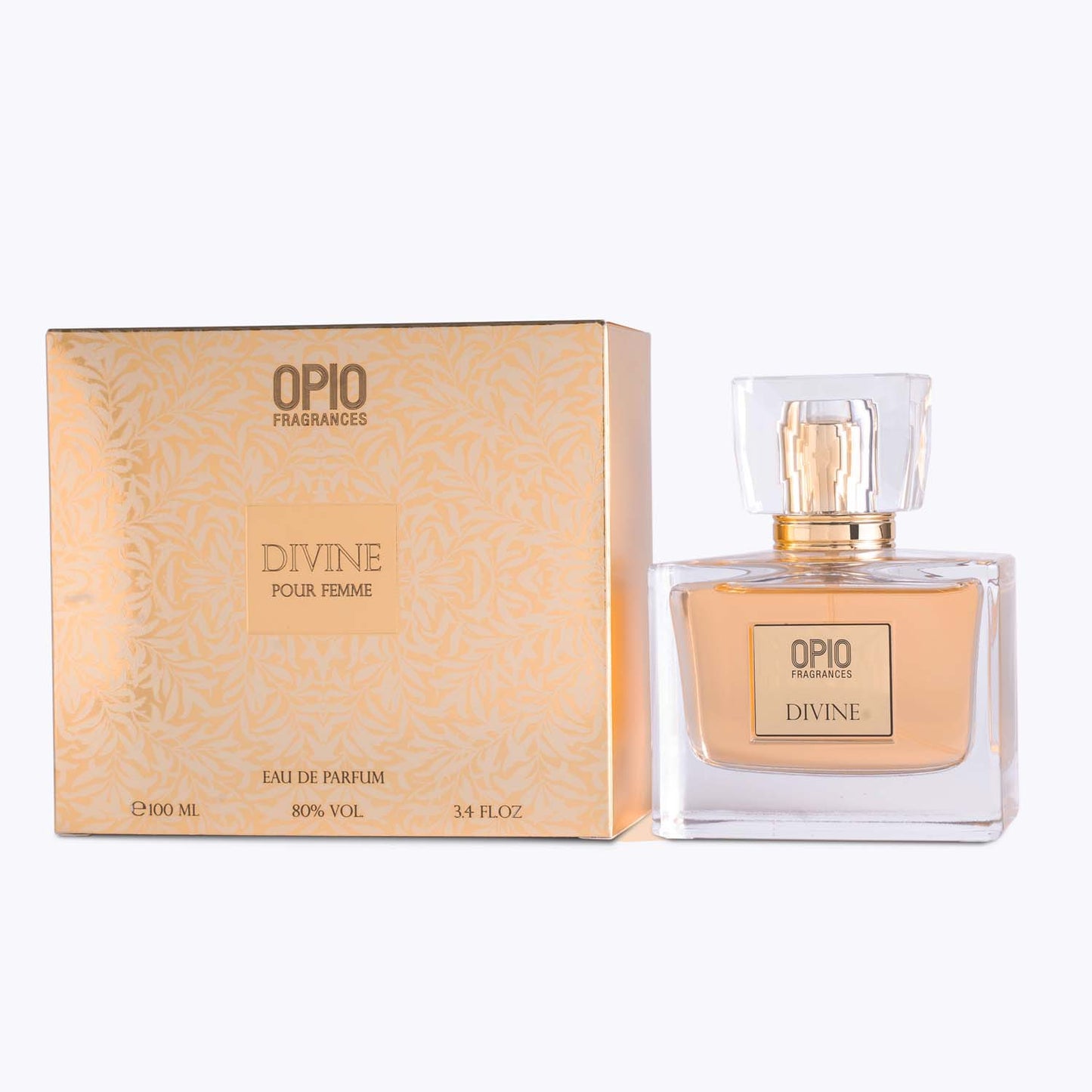 A clear bottle of perfume labeled 'DIVINE' with a transparent cap and with box.