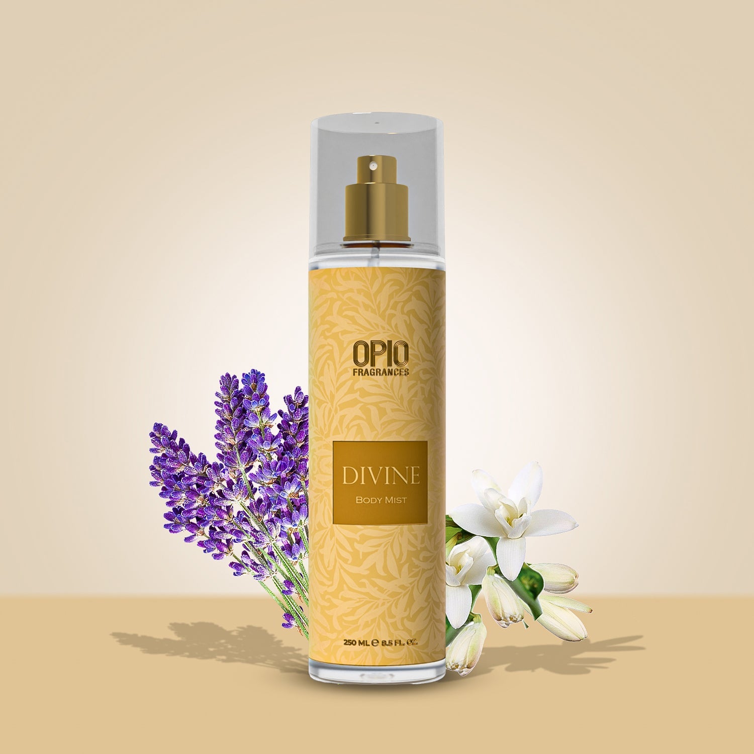 A clear spray bottle labeled 'DIVINE' by Opio Fragrances, with a gold-colored cap, surrounded by purple flowers and white lilies on a beige background.
