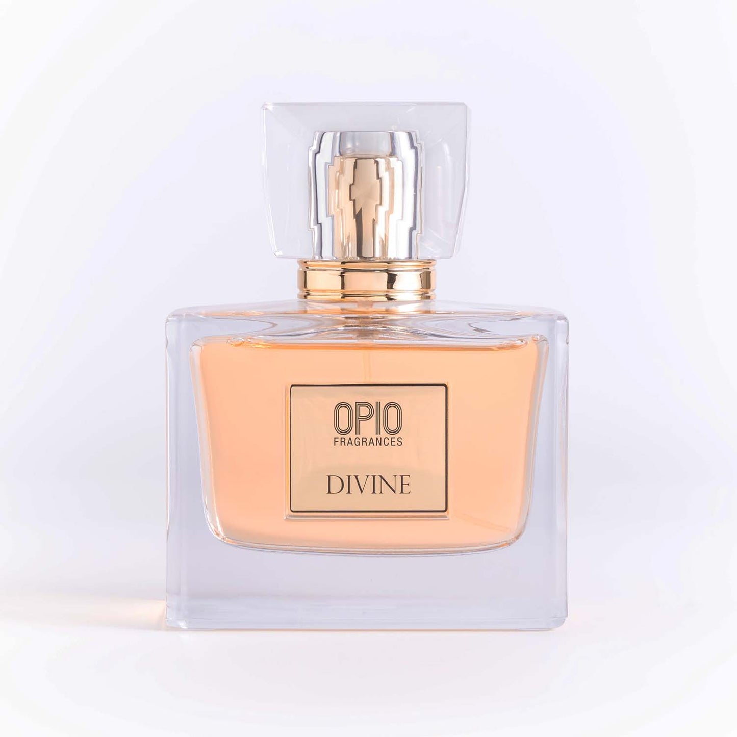 A clear bottle of perfume labeled 'DIVINE' with a transparent cap.