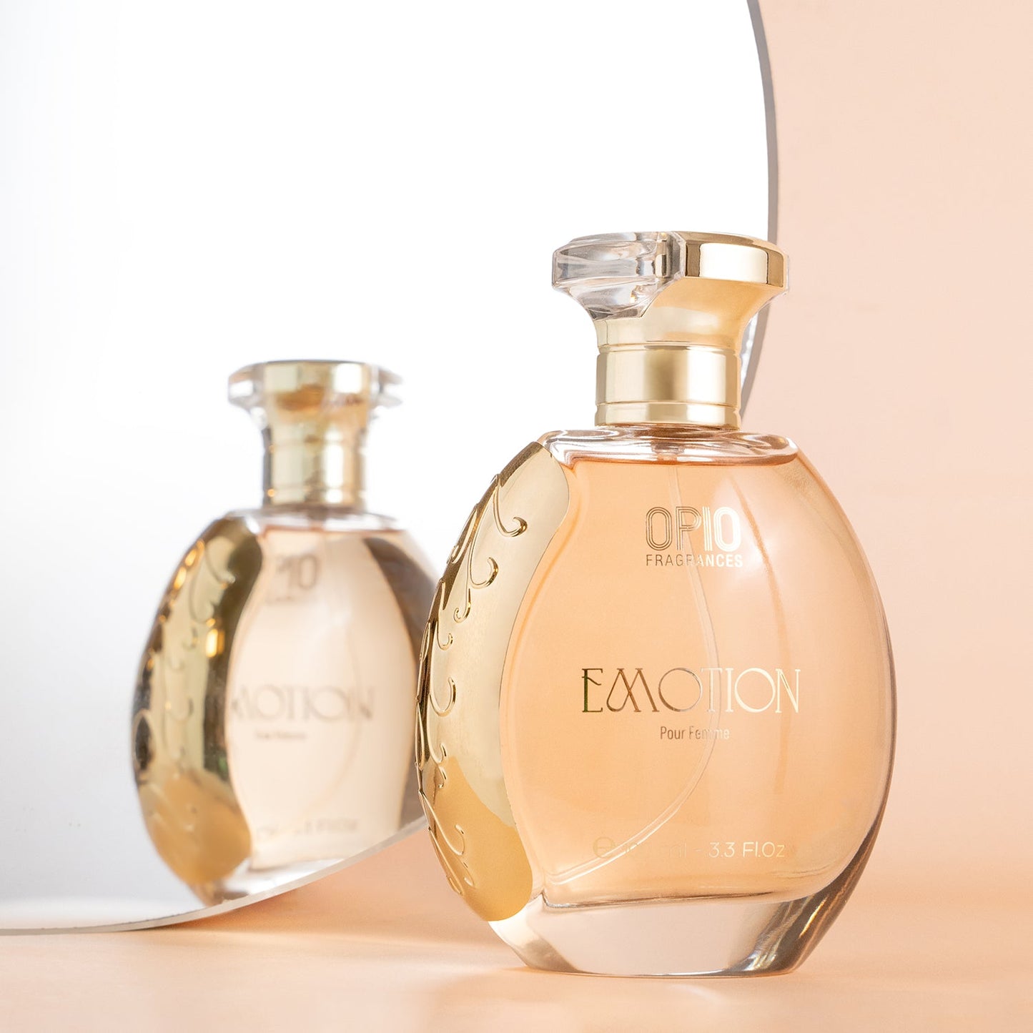 A bottle of Opio Emotion perfume, with a clear liquid, displayed against a neutral background.