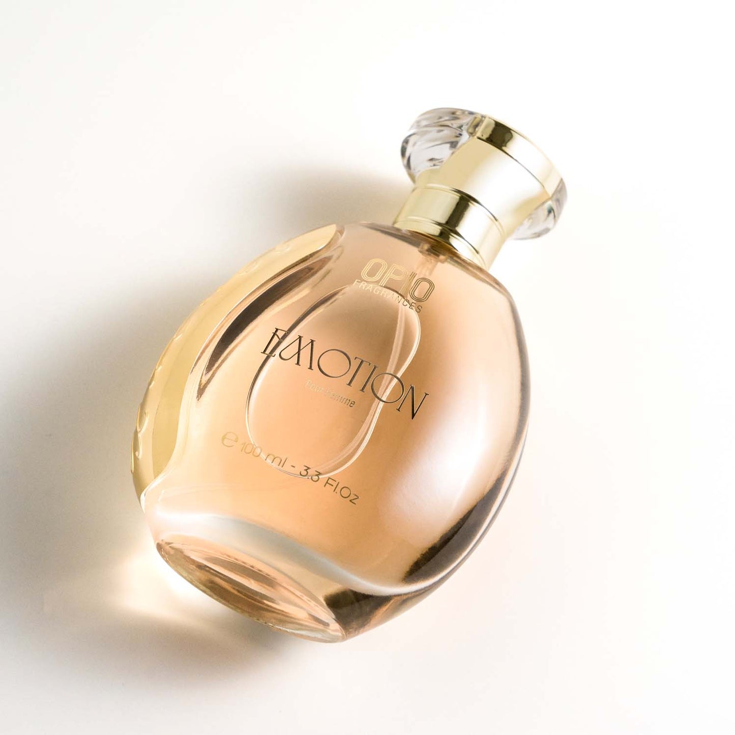 A bottle of Opio Emotion perfume, with a clear liquid, displayed against a neutral background.