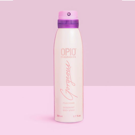 A bottle of OPIO Gorgeous body spray for women, with a pink cap and a label that includes the product name and the word 'Fragrances'.