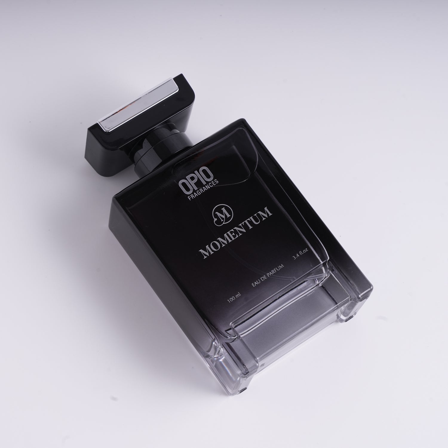 A black bottle of OPIO Momentum eau de parfum for men.
