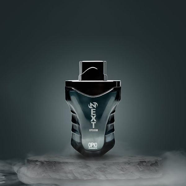 A bottle of 'NEXT EPISODE EDP' by OPIO, with a sleek black design, positioned on a dark textured surface, surrounded by a cloud of fragrance.