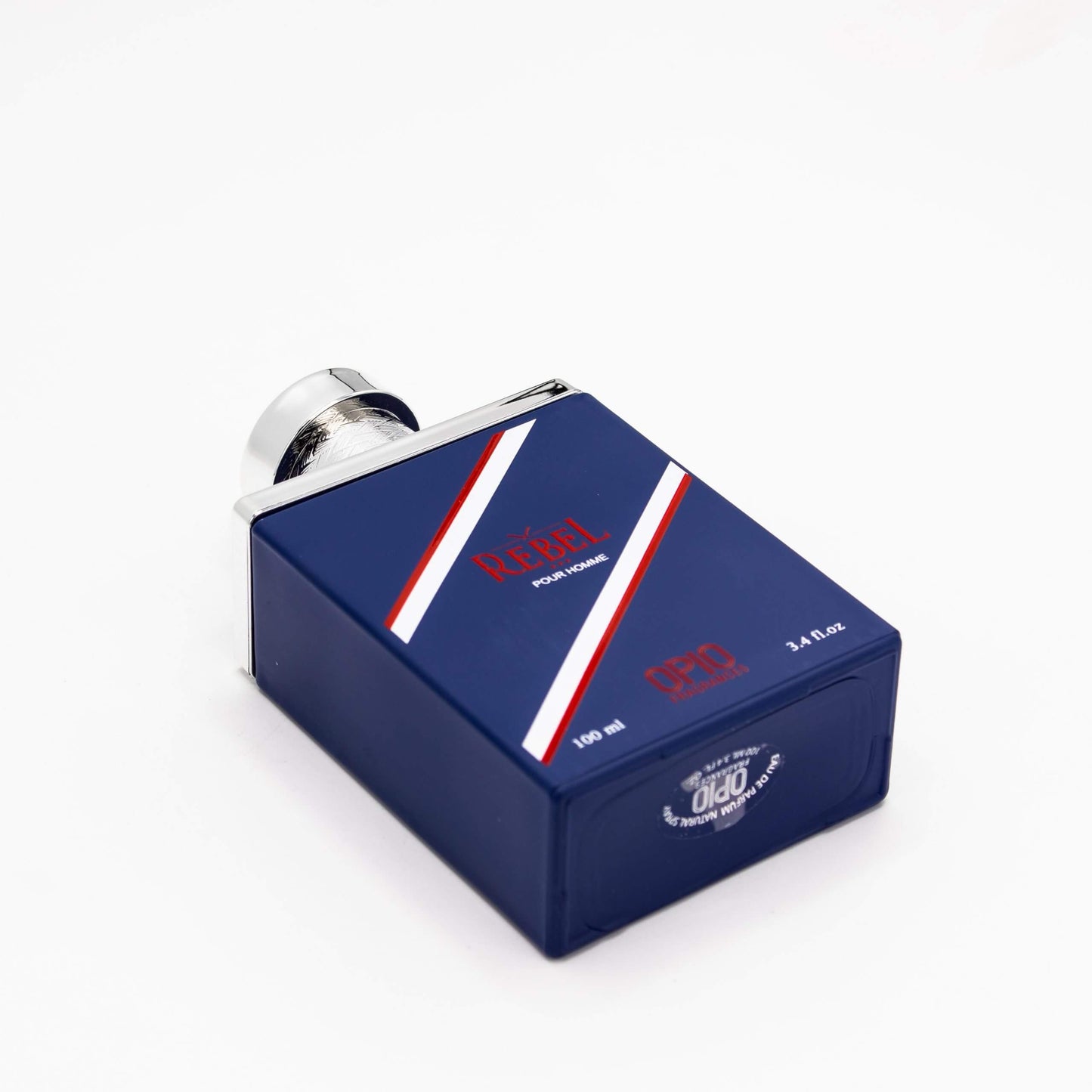 A perfume bottle with the label 'OPIO FRAGRANCES REBEL' in red and white stripes against a blue background.