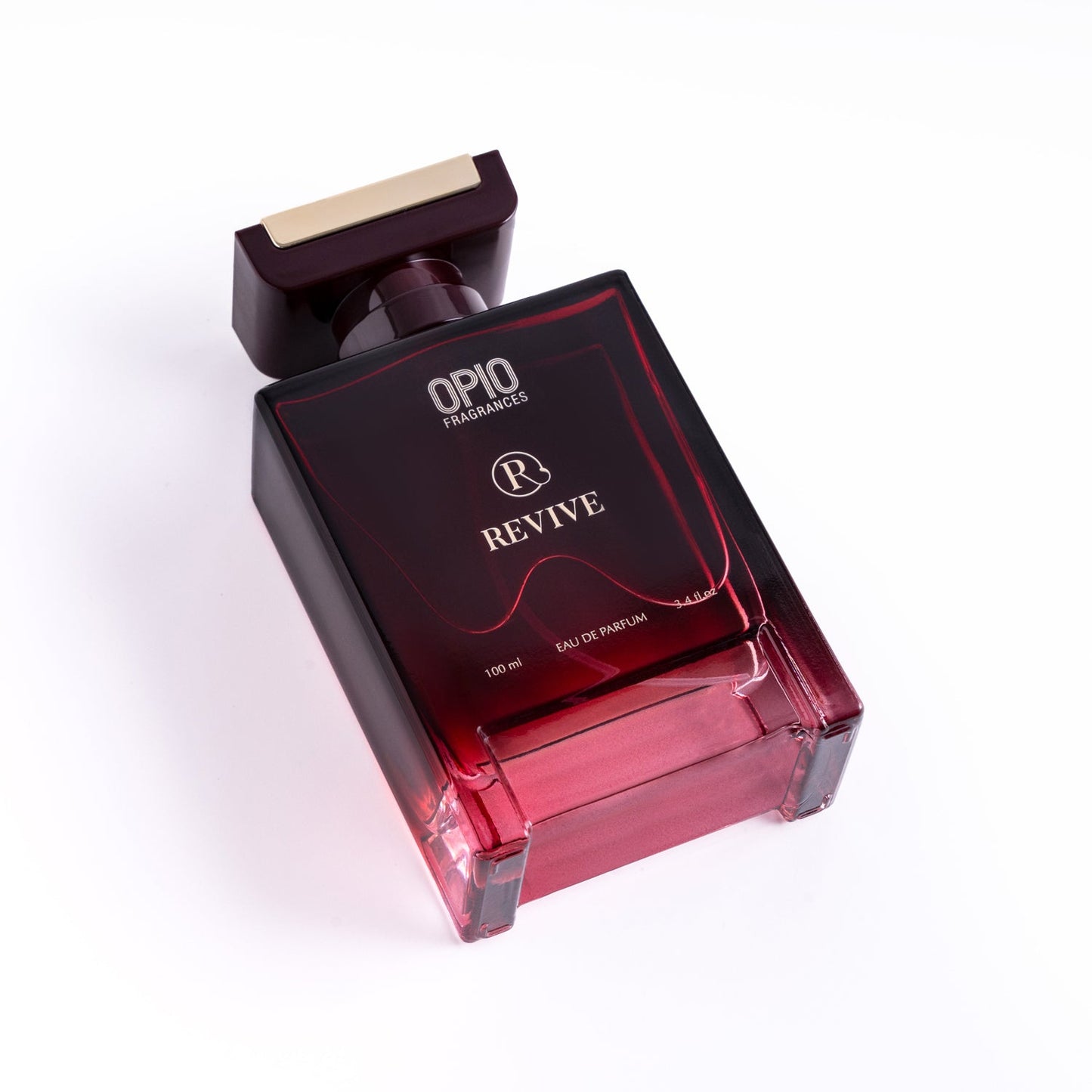 A bottle of OPIO Revive fragrance for men.